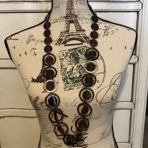 18” long brown link necklace.